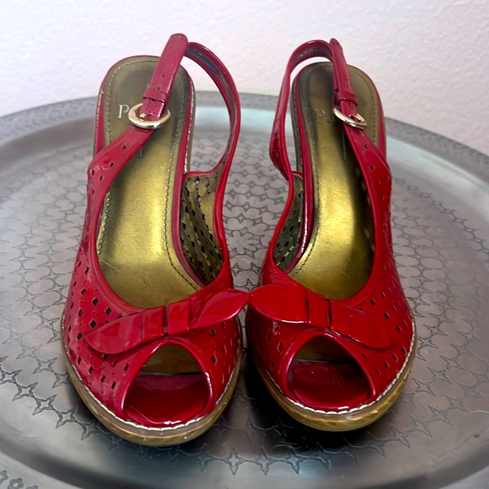 Pin-up Perfection! Red patent leather sling back wedge heels.